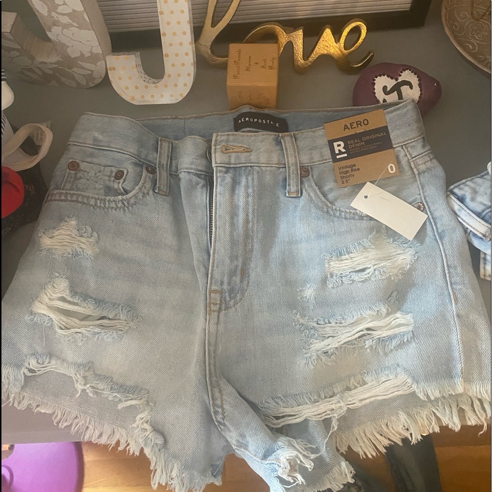 Aero ripped jean shorts